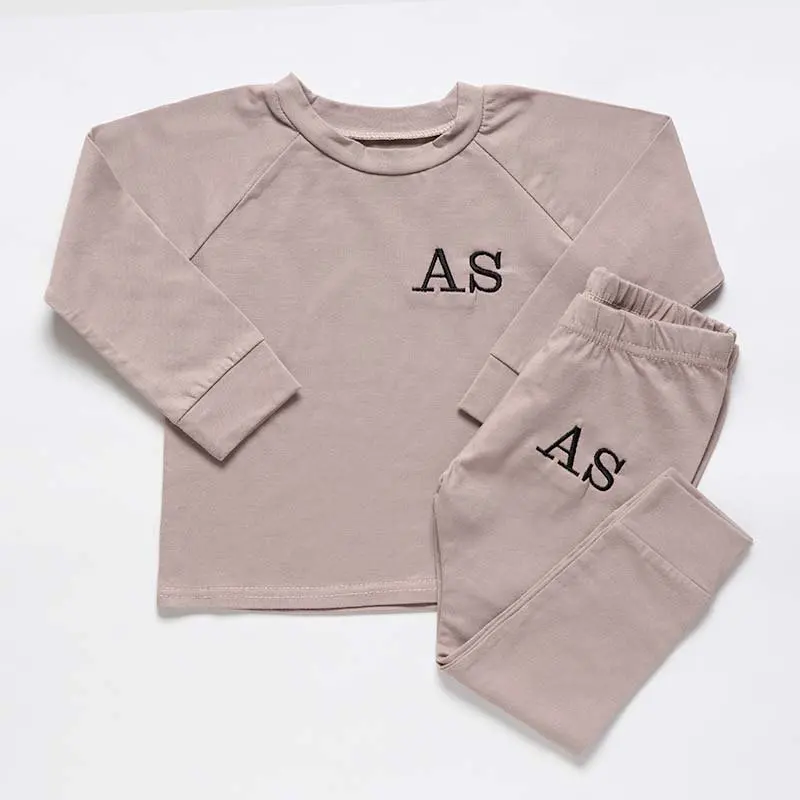 Long-sleeved top and bottoms with initials