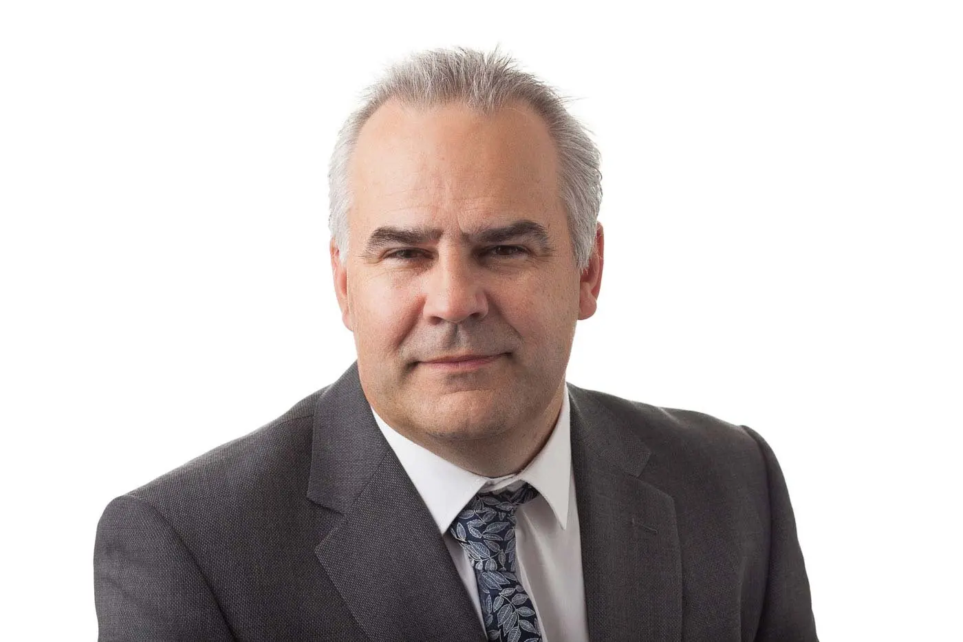 Business headshot against pure white