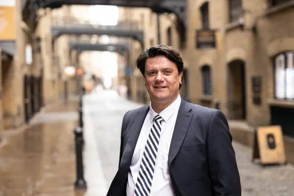 Outdoor business headshot on a cobbled London street