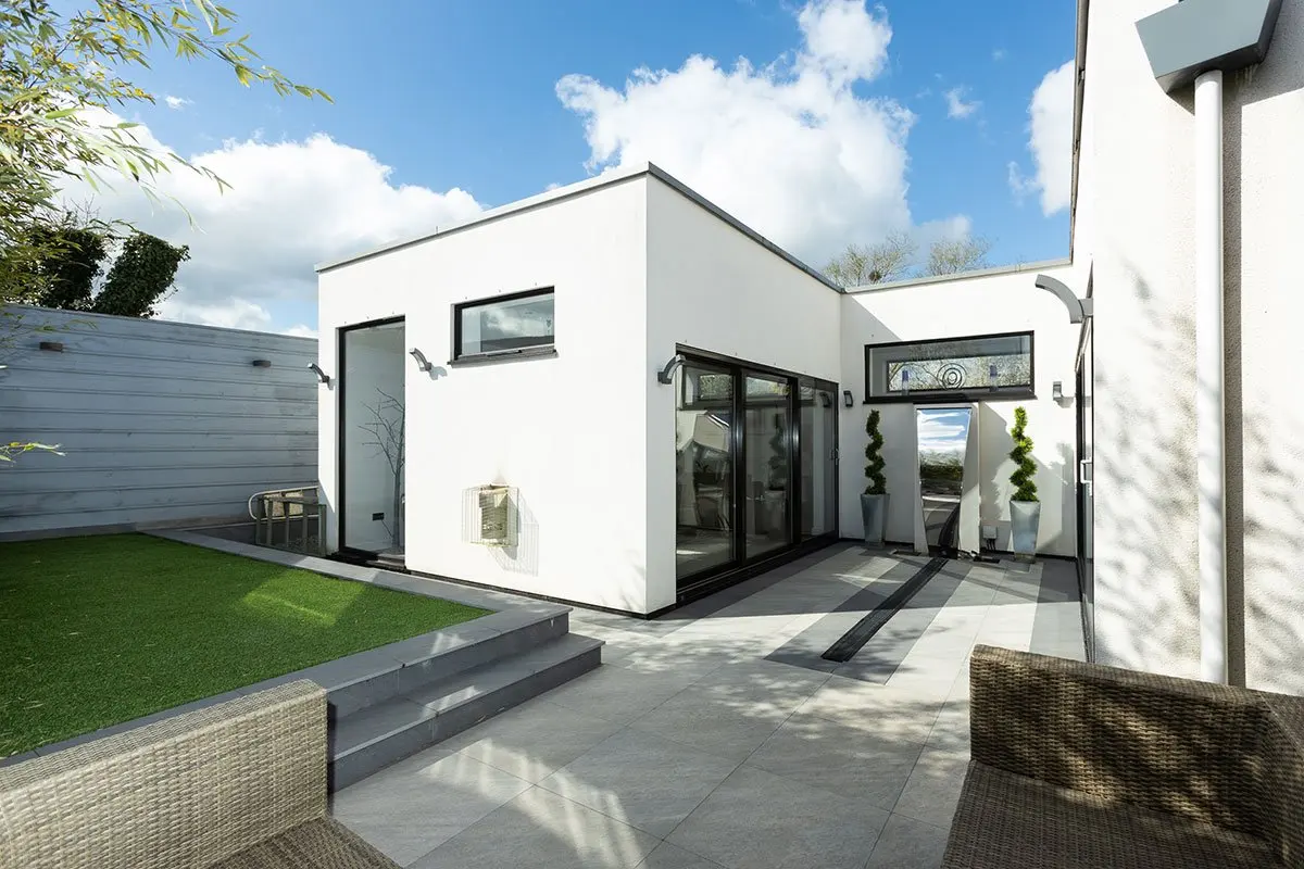 The extension seen from the garden, with its glazed lounge