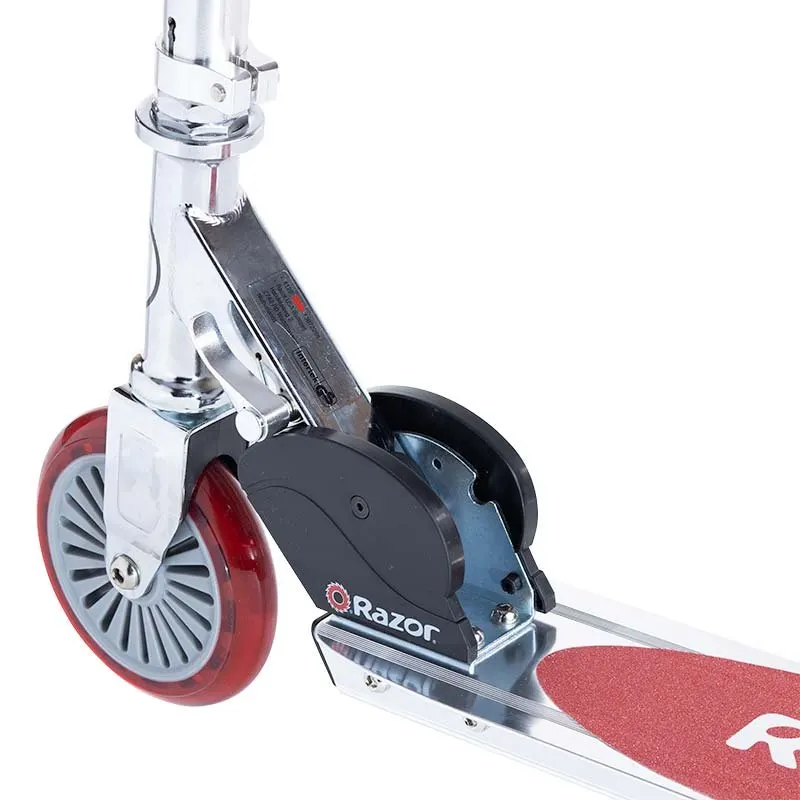 Close-up of a red scooter wheel