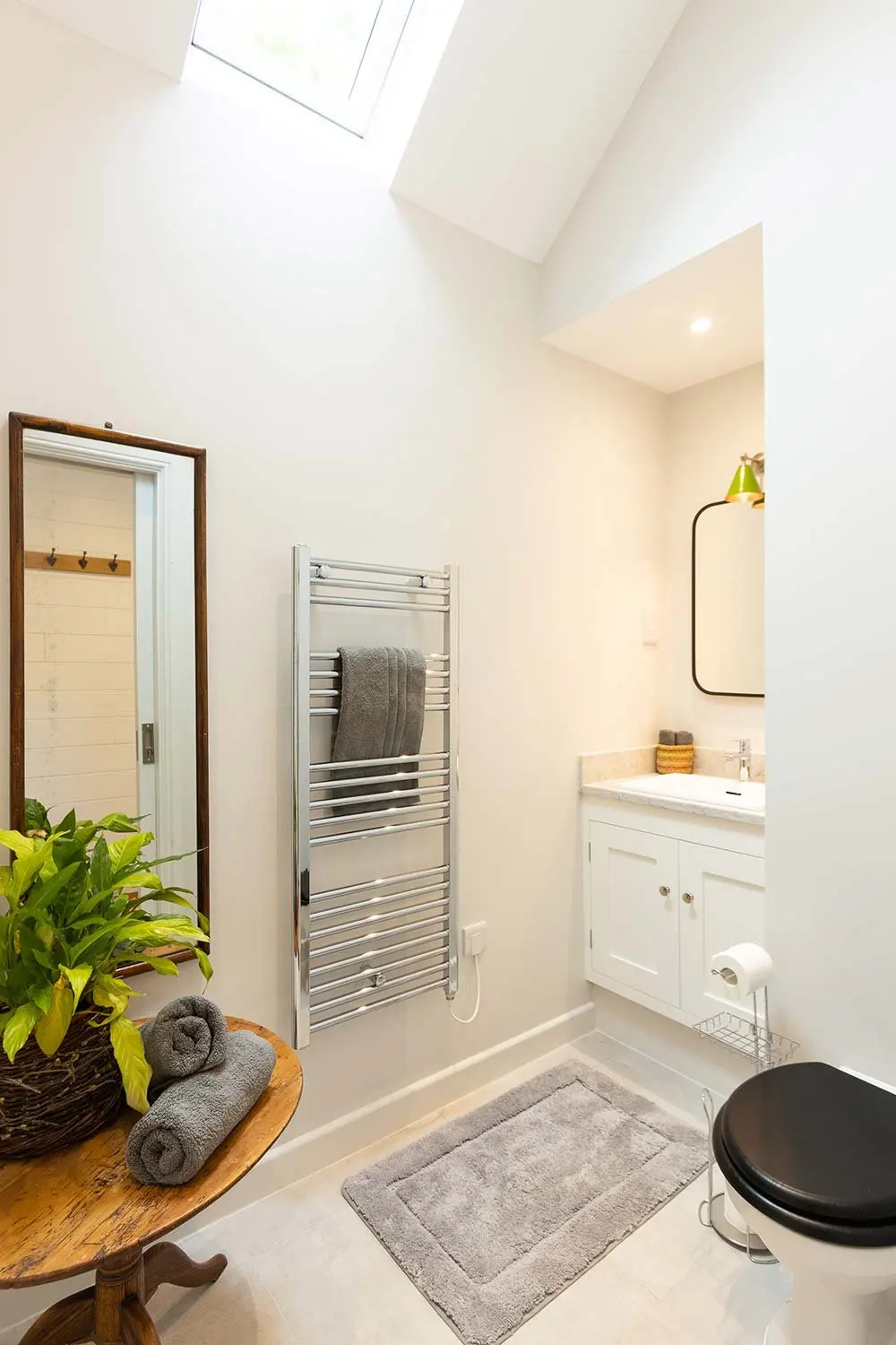 Bathroom with a heated towel rail