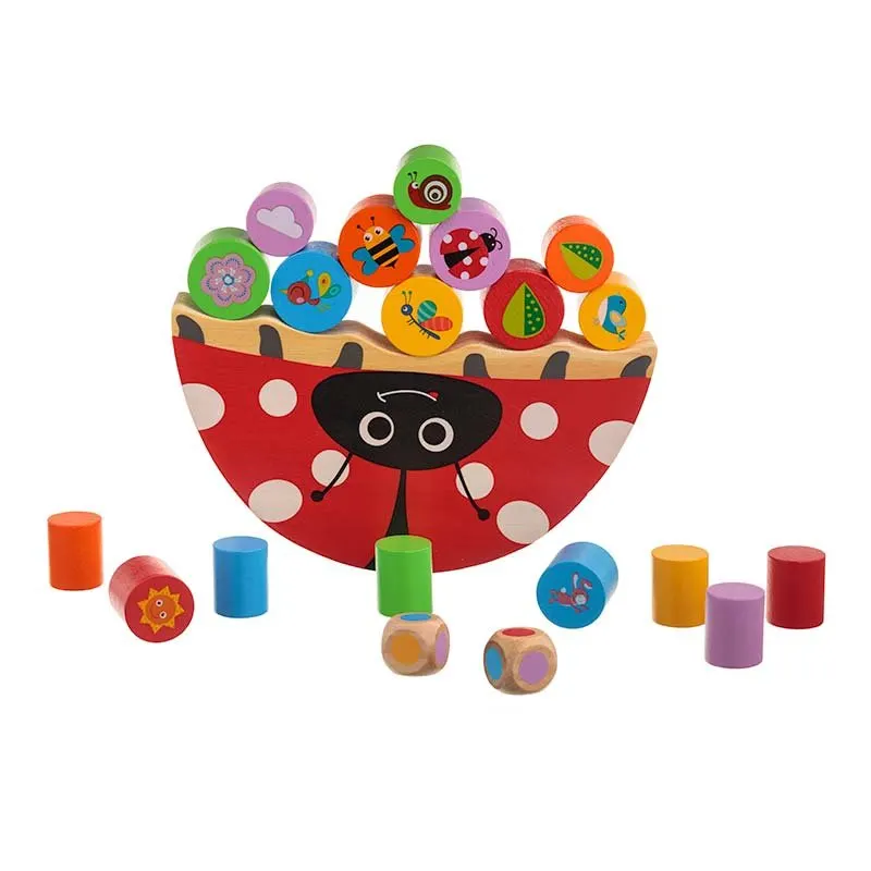 Wooden balancing game with colourful pieces, photographed on white