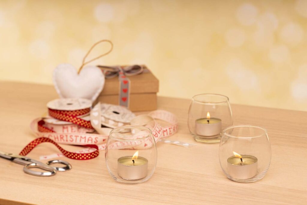 styled Christmas product photography xmas tea light candles lit